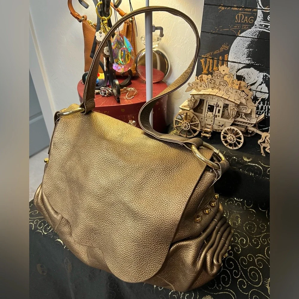 Chi Gold Metallic Pebble Leather Hobo Bag with Metal Embellishments